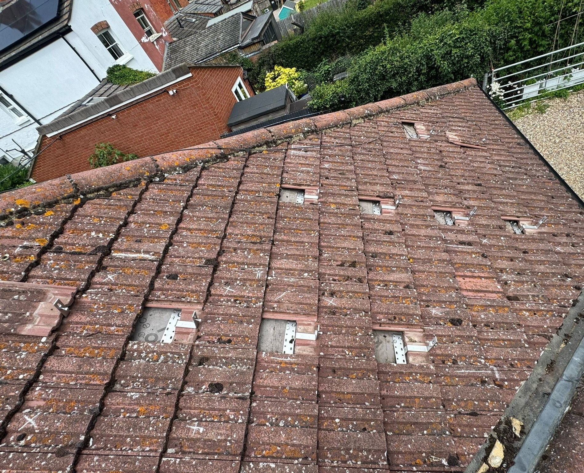 Pitched tile roof rafter bracket mounting